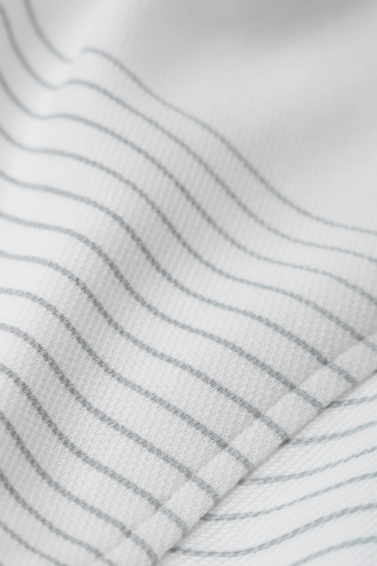 Chi Tiết Chất Vải Áo Polo Elon Polomanor Màu Trắng Sọc Xanh Cotton Interlock Regular Fit